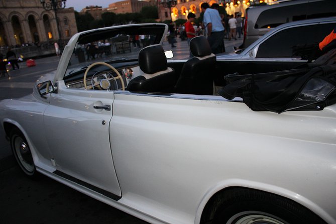 Yerevan city tour with drinks in a classic car with photography - Vernissage adds local color, even from the car